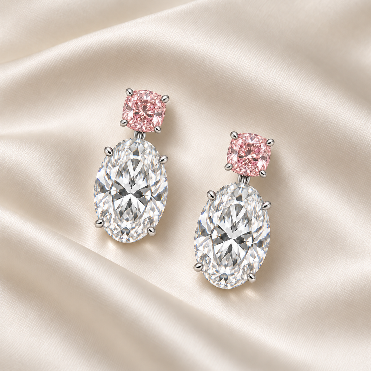 AI design illustration of the pink cushion and oval diamond earring pair resting face-up on ivory silk.