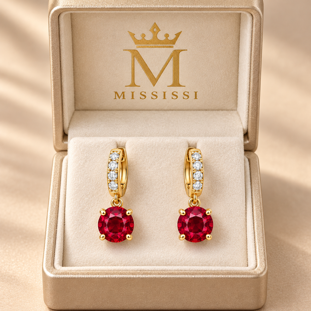 MISSISSI ME05 round lab-grown ruby drops on lab-grown diamond huggie hoops in yellow gold, pair in a MISSISSI-branded packaging concept; design visualization