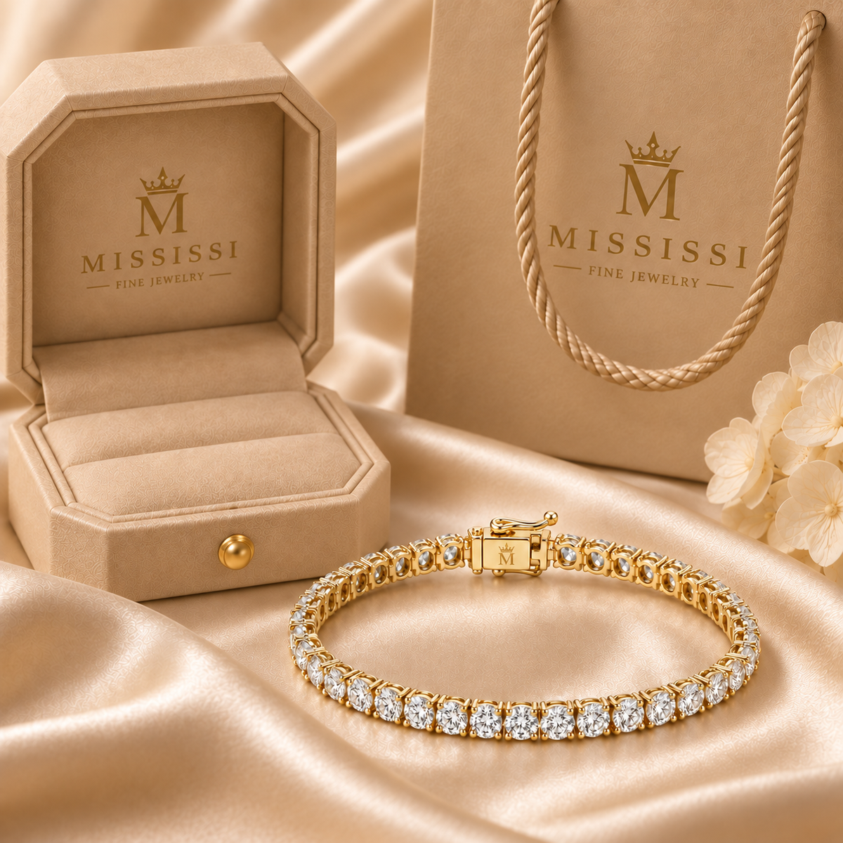 MISSISSI champagne presentation box and packaging with the round diamond tennis bracelet. AI-edited crown-M engraving concept on the existing clasp face; engraving and scale are illustrative.