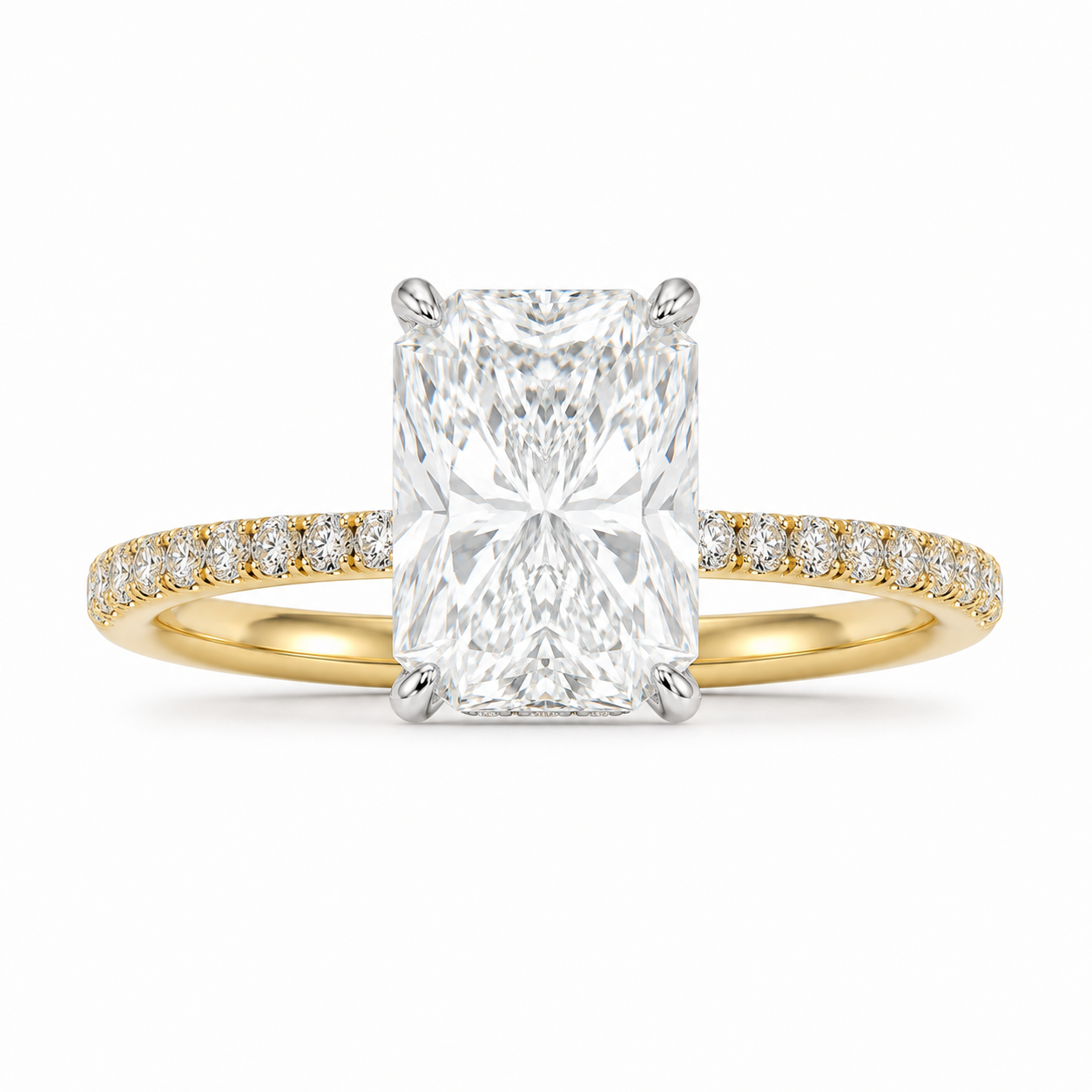Front view of 4 carat elongated radiant diamond ring with pavé yellow gold band