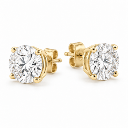 Three-quarter view of round lab-grown diamond stud earrings showing the basket settings.