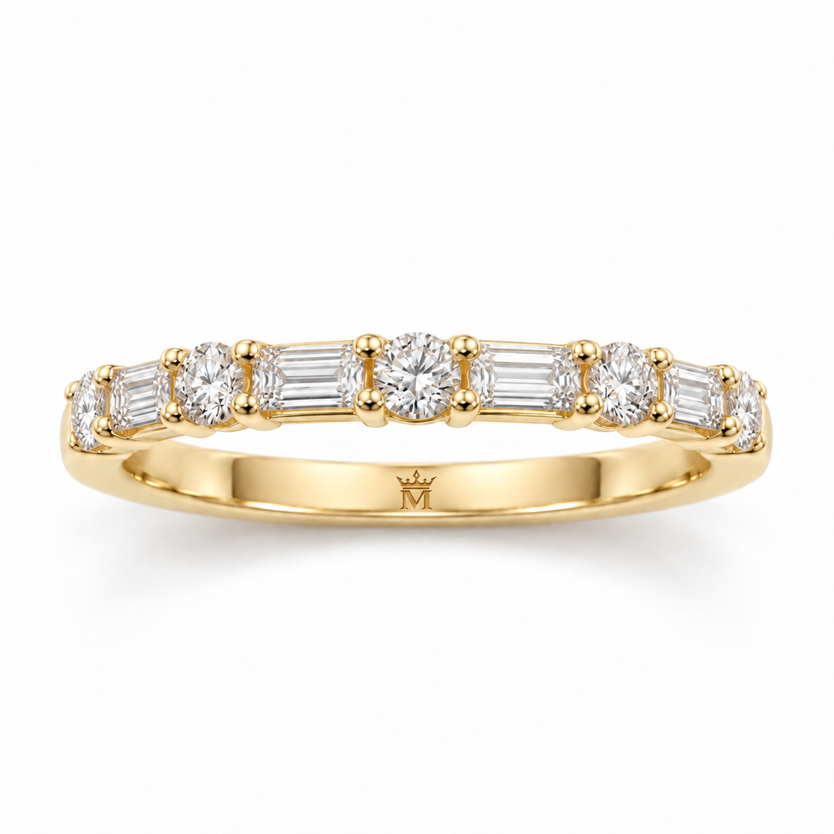 Top view of alternating round and baguette lab-grown diamonds across the half-eternity band. AI-edited crown-M engraving concept inside the lower band; engraving and scale are illustrative.