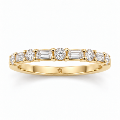Top view of alternating round and baguette lab-grown diamonds across the half-eternity band. AI-edited crown-M engraving concept inside the lower band; engraving and scale are illustrative.