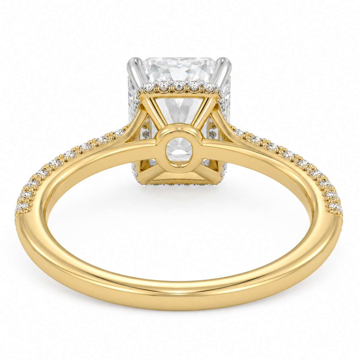 Side profile of elongated radiant diamond ring with hidden halo and cathedral setting