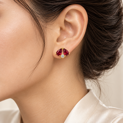 MISSISSI Scarlet Fold Twin-Pear Lab-Grown Ruby & Diamond Studs in yellow gold, worn design visualization