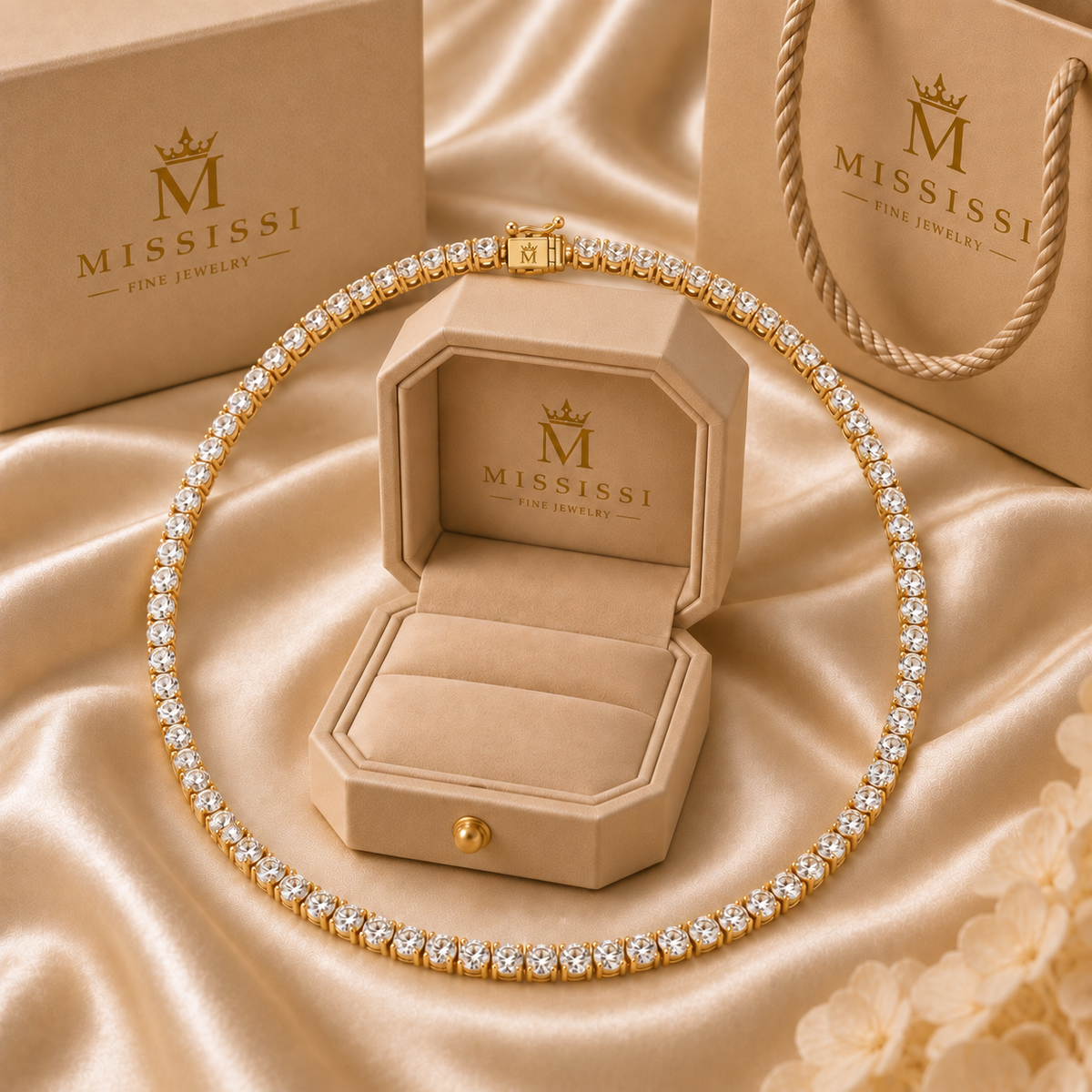 Champagne-beige MISSISSI presentation with a round diamond tennis necklace. AI-edited crown-M engraving concept on the existing clasp face; engraving and scale are illustrative.