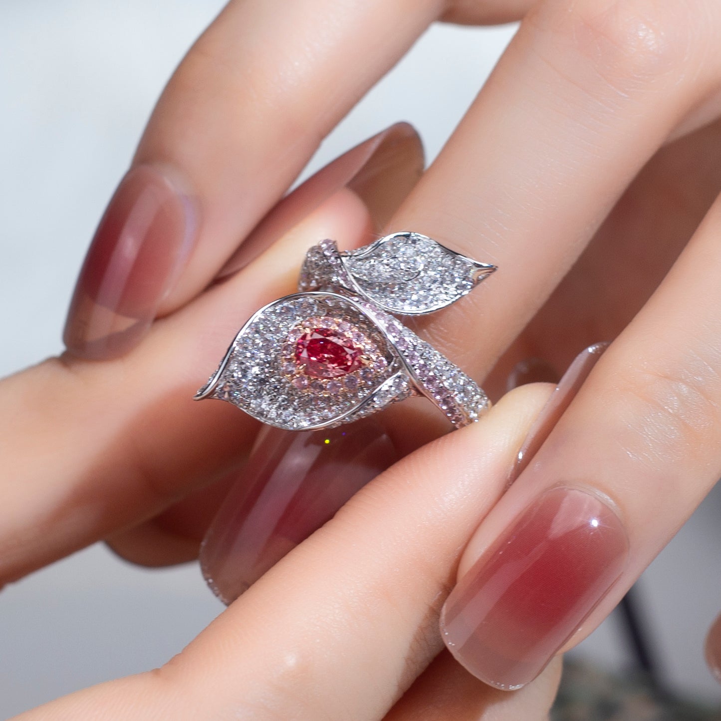 Luxury White Diamond Ring with Pink Diamond Accents | Leaf Design, Symbolic & Elegant