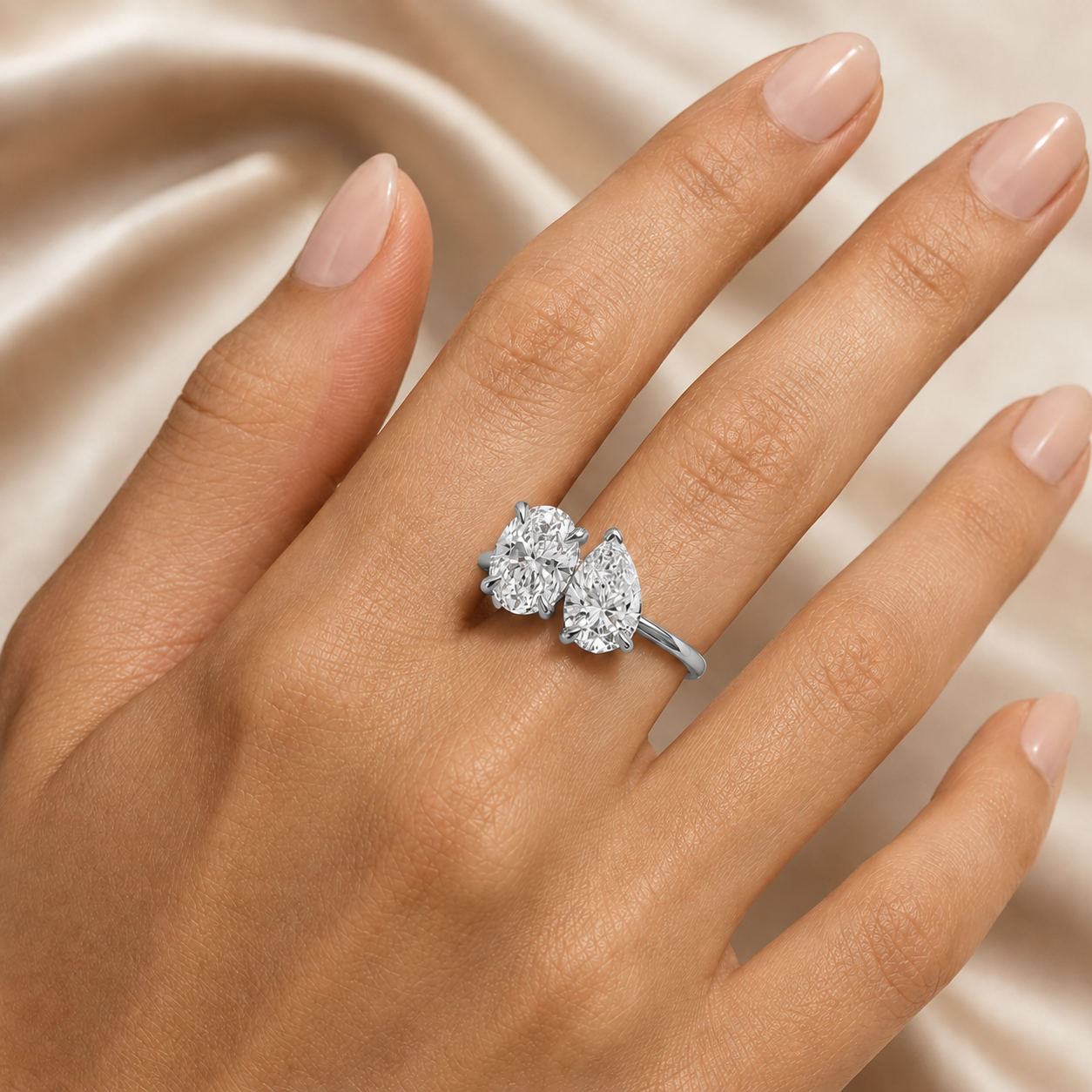 2 Carat Oval and Pear Toi et Moi Platinum Lab Grown Diamond Ring worn on hand