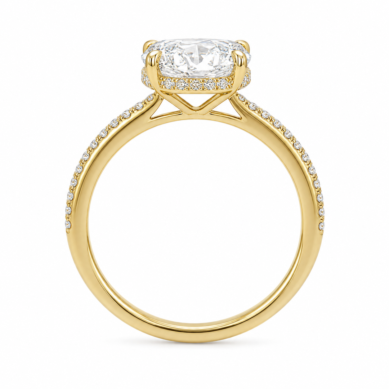 Left 45-degree view of an oval diamond ring showing the hidden halo and engraved inner band