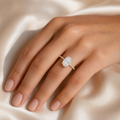 Right 45-degree view of a 5 carat oval diamond ring with MISSISSI crown and M engraving