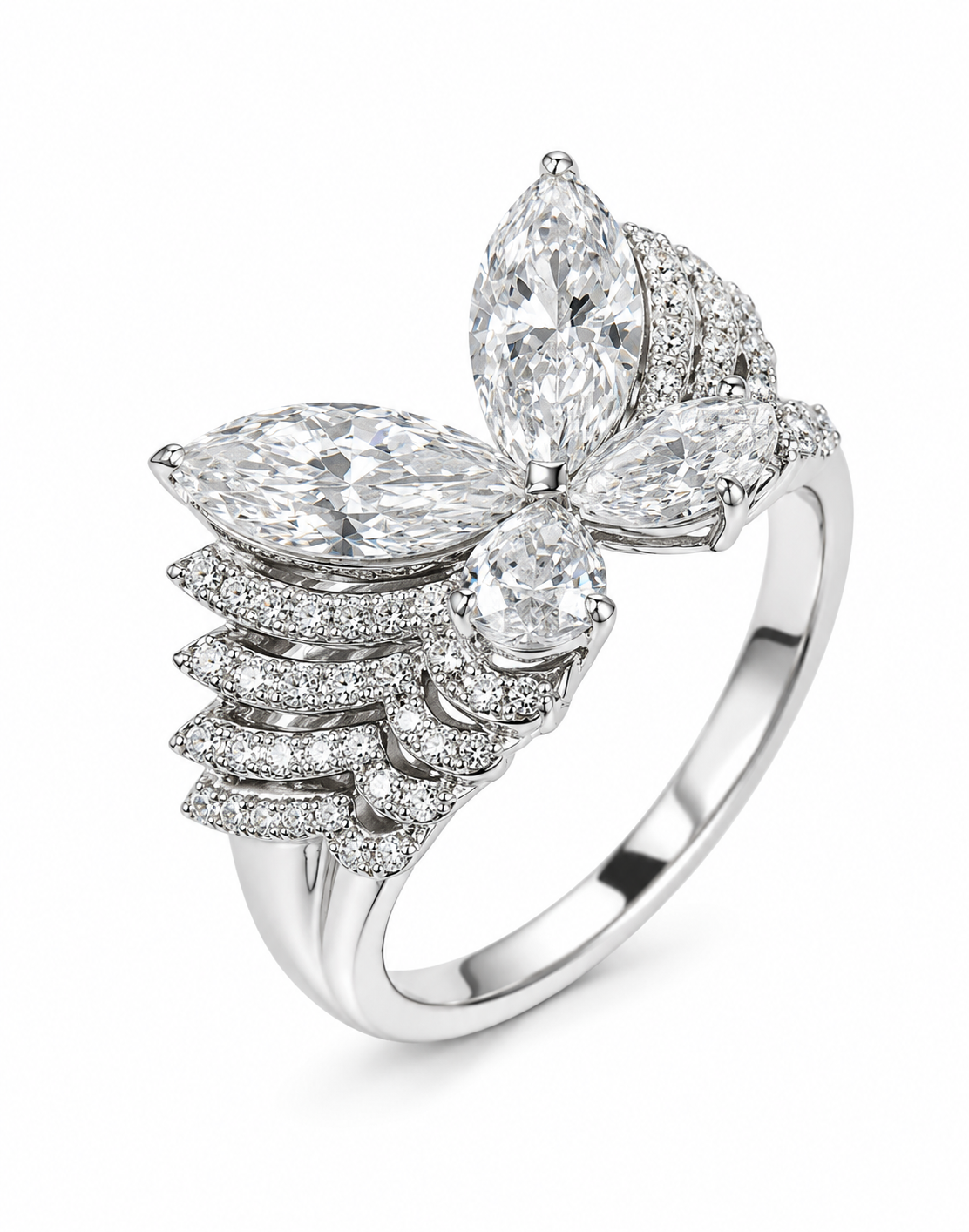 A sculptural butterfly diamond ring featuring two 3-carat marquise-cut diamonds and two 2-carat pear-cut diamonds, creating 10 carats across the four featured stones. The four diamonds form luminous butterfly wings above a wide, multi-row pavé-set band.