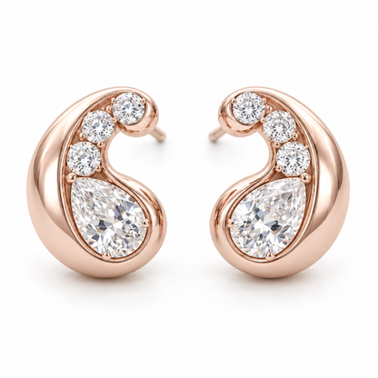 MISSISSI AA13 paired earrings in pale rose gold tone, front view showing mirrored rounded comma-shaped curls around pear-shaped diamonds, with three round diamond accents per earring; design visualization