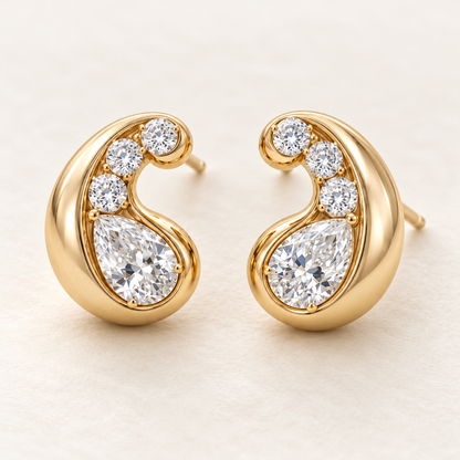 MISSISSI AA13 paired earrings in yellow gold tone, three quarter view showing mirrored rounded comma-shaped curls around pear-shaped diamonds, with three round diamond accents per earring; design visualization