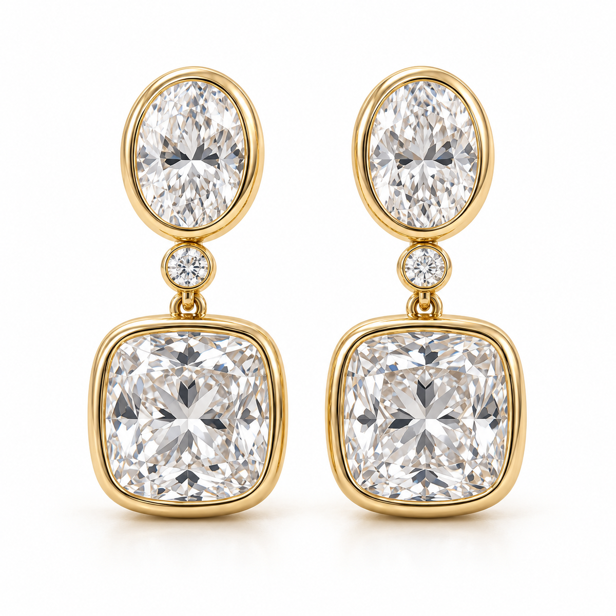 MISSISSI AA14 paired earrings in yellow gold tone, front view showing an oval diamond above one small round connector diamond and a cushion-shaped drop in rounded bezels; design visualization