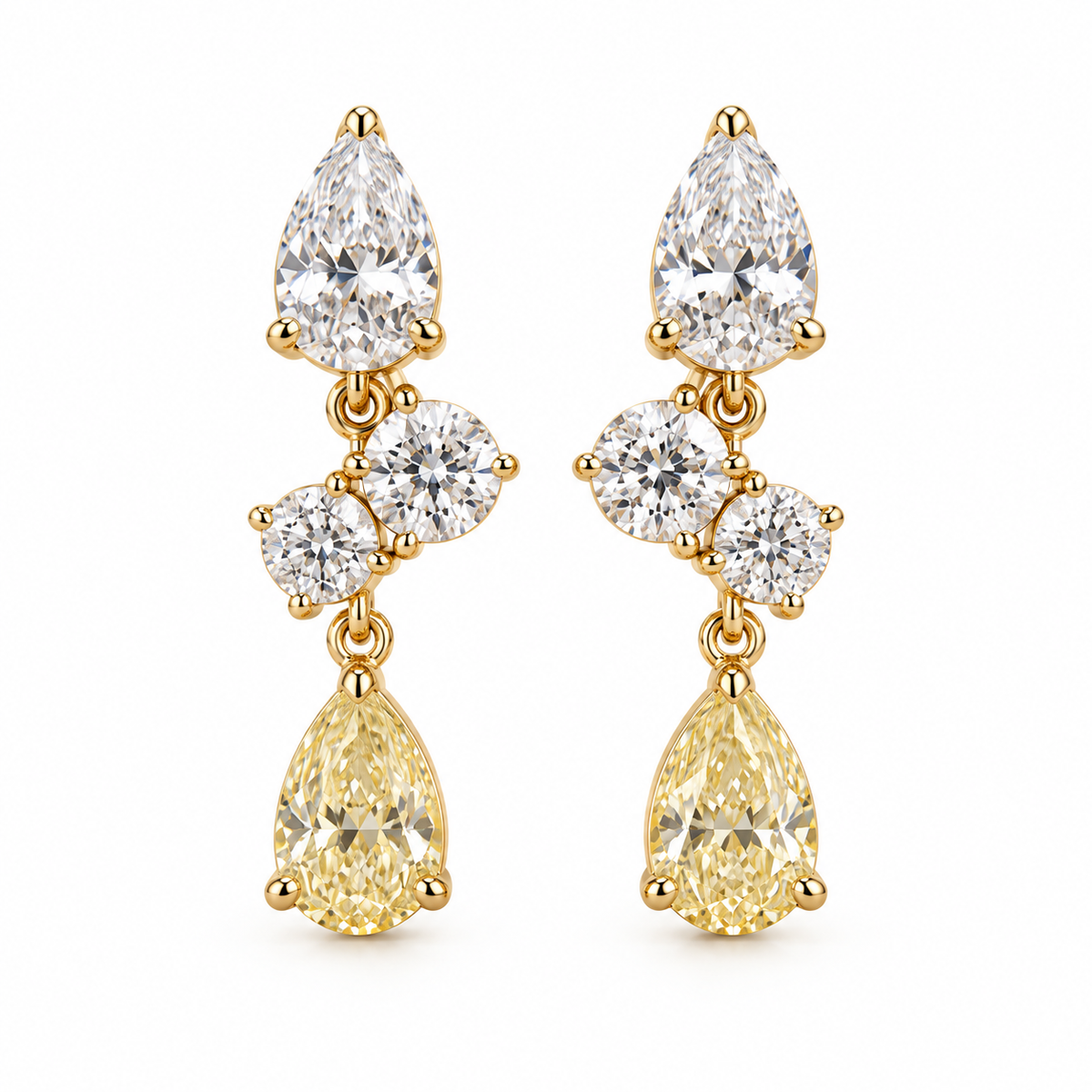 MISSISSI AA20 paired earrings in yellow gold tone, front view showing a white pear-shaped diamond above two diagonally arranged round diamonds and a pale-yellow pear-shaped drop; design visualization