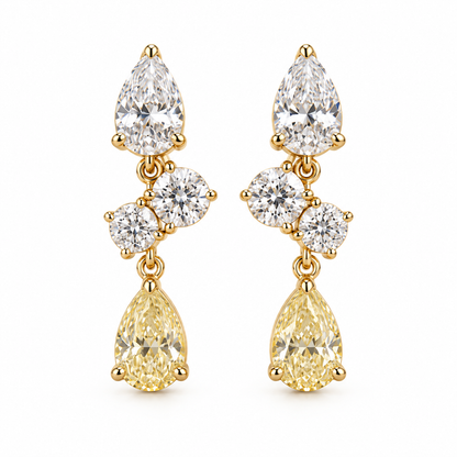 MISSISSI AA20 paired earrings in yellow gold tone, front view showing a white pear-shaped diamond above two diagonally arranged round diamonds and a pale-yellow pear-shaped drop; design visualization