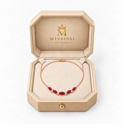 MISSISSI Crimson Crescent lab-grown ruby necklace in rose gold, presented in champagne octagonal packaging with crown M branding; design visualization.