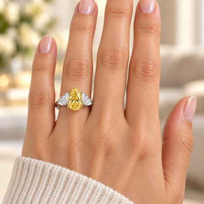 Solar Pleat pear lab-grown diamond ring, adult left-hand wearing design visualization