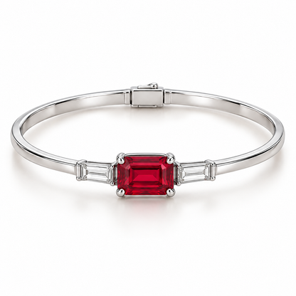 MISSISSI H26-RB02 white gold bangle with an east-west emerald-cut lab-grown ruby and two baguette lab-grown diamonds. Main product view.; design visualization