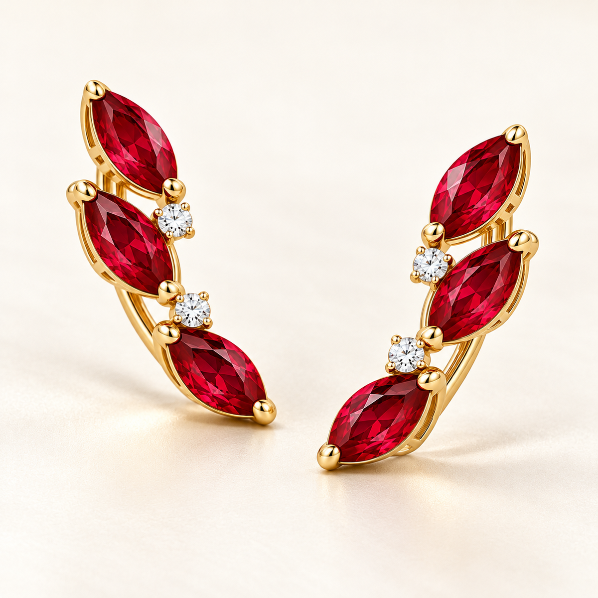 Three-quarter view of RE03 yellow gold climber earrings with three marquise rubies per earring; design visualization