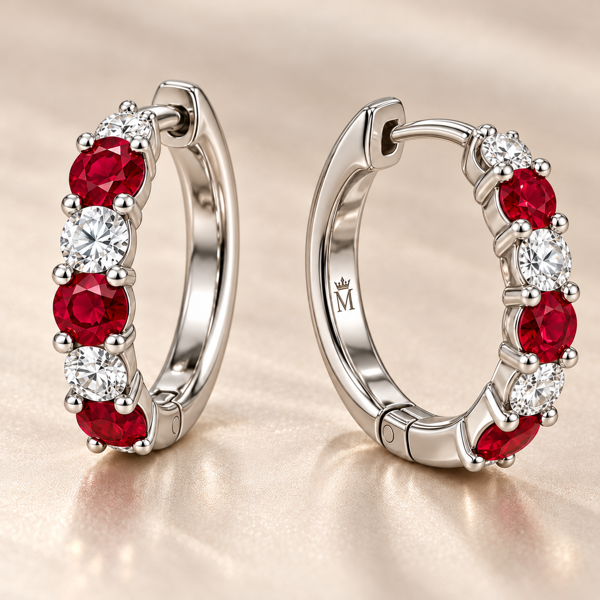 Interior and clasp detail of RE04 white gold ruby and diamond hoops with crown-M engraving; design visualization