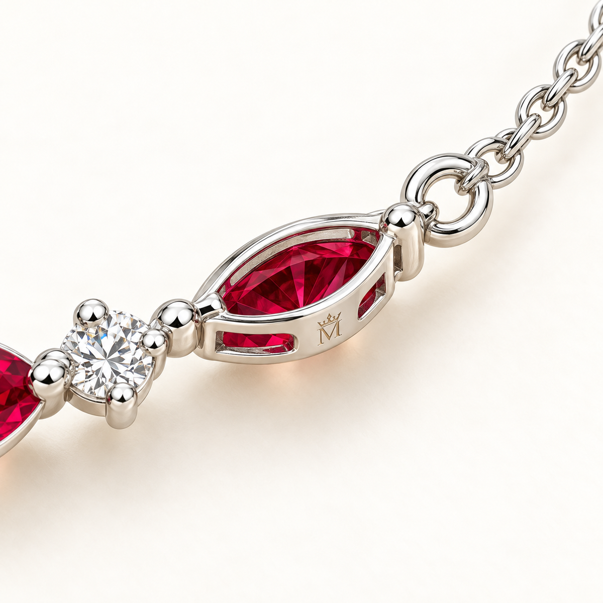 Chain connection and crown-M engraving detail of MISSISSI marquise lab-grown ruby and round lab-grown diamond white gold necklace; design visualization