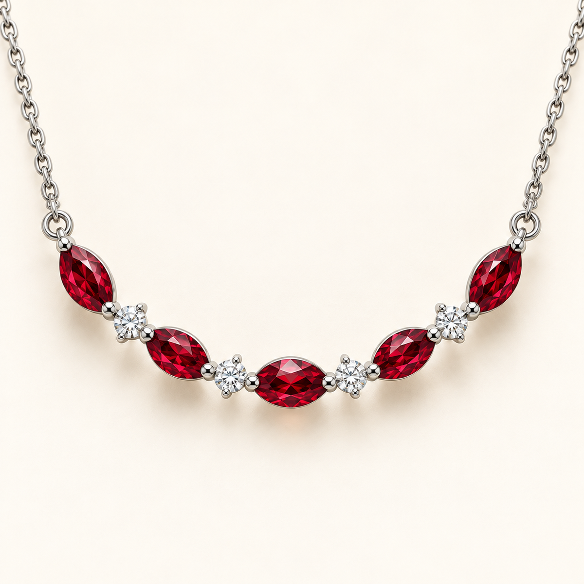 Macro setting detail of MISSISSI marquise lab-grown ruby and round lab-grown diamond white gold necklace; design visualization