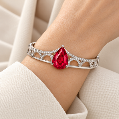 MISSISSI HR26-B19 lab-grown ruby bangle, worn on a wrist. Design visualization.