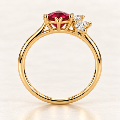 MISSISSI Crimson Feather pear-shaped lab-grown ruby ring in yellow gold with three marquise lab-grown diamond accents, side setting visualization.