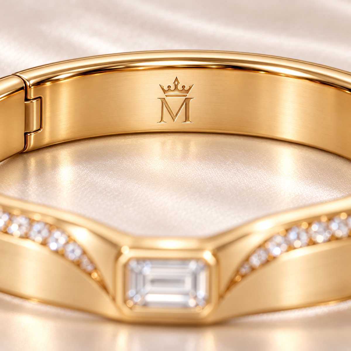 MISSISSI CROWNLINE lab-grown diamond bangle in yellow metal, inner crown-and-M engraving detail; design visualization