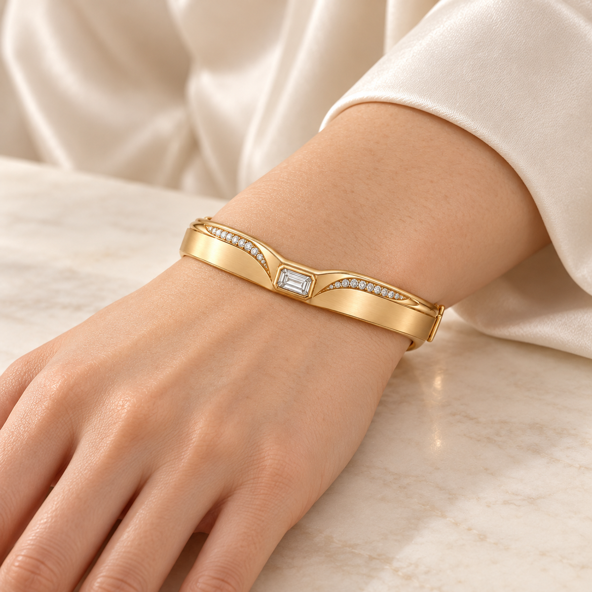 MISSISSI CROWNLINE lab-grown diamond bangle in yellow metal, on an adult light-skinned wrist; design visualization