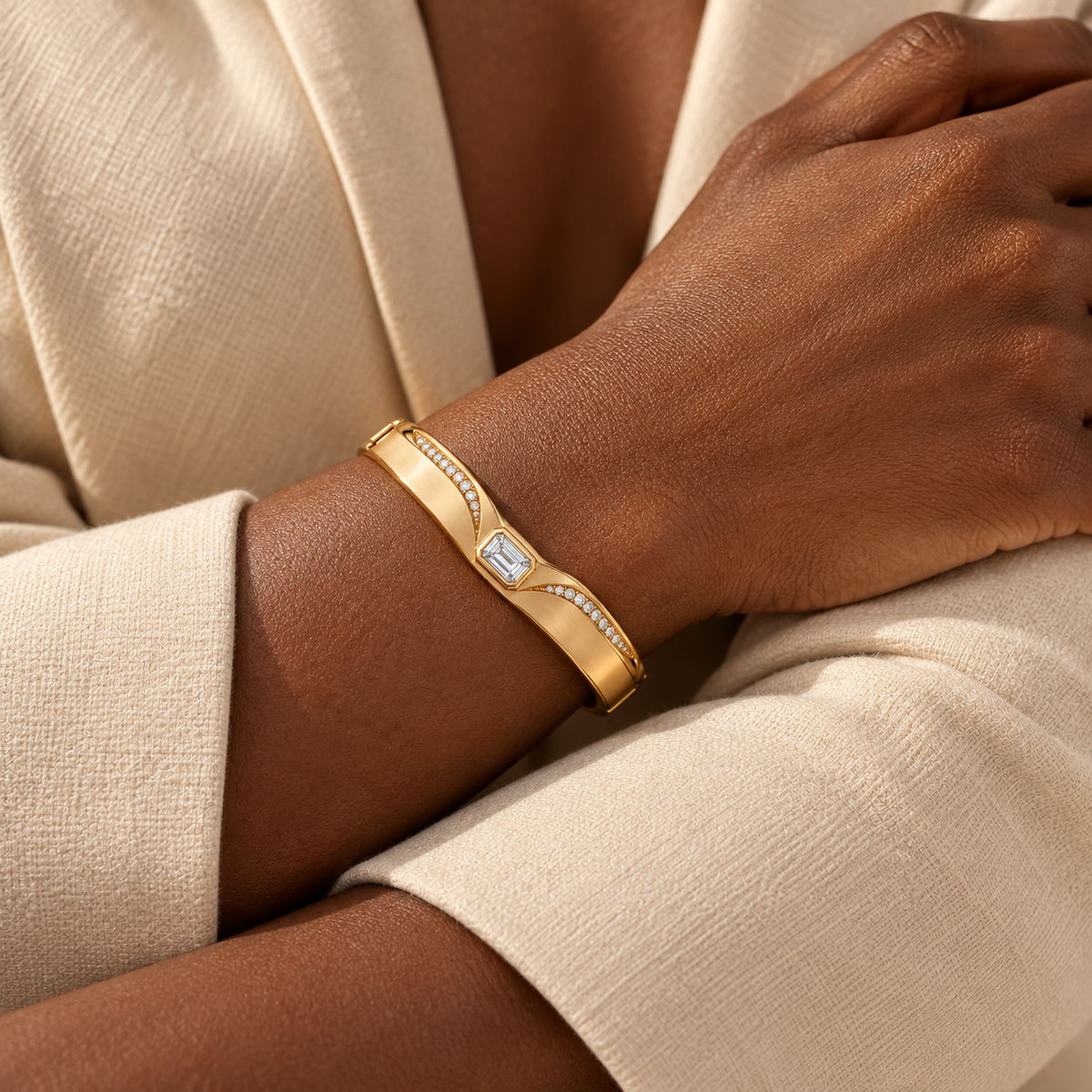 MISSISSI CROWNLINE lab-grown diamond bangle in yellow metal, on an adult deep-brown-skinned wrist; design visualization