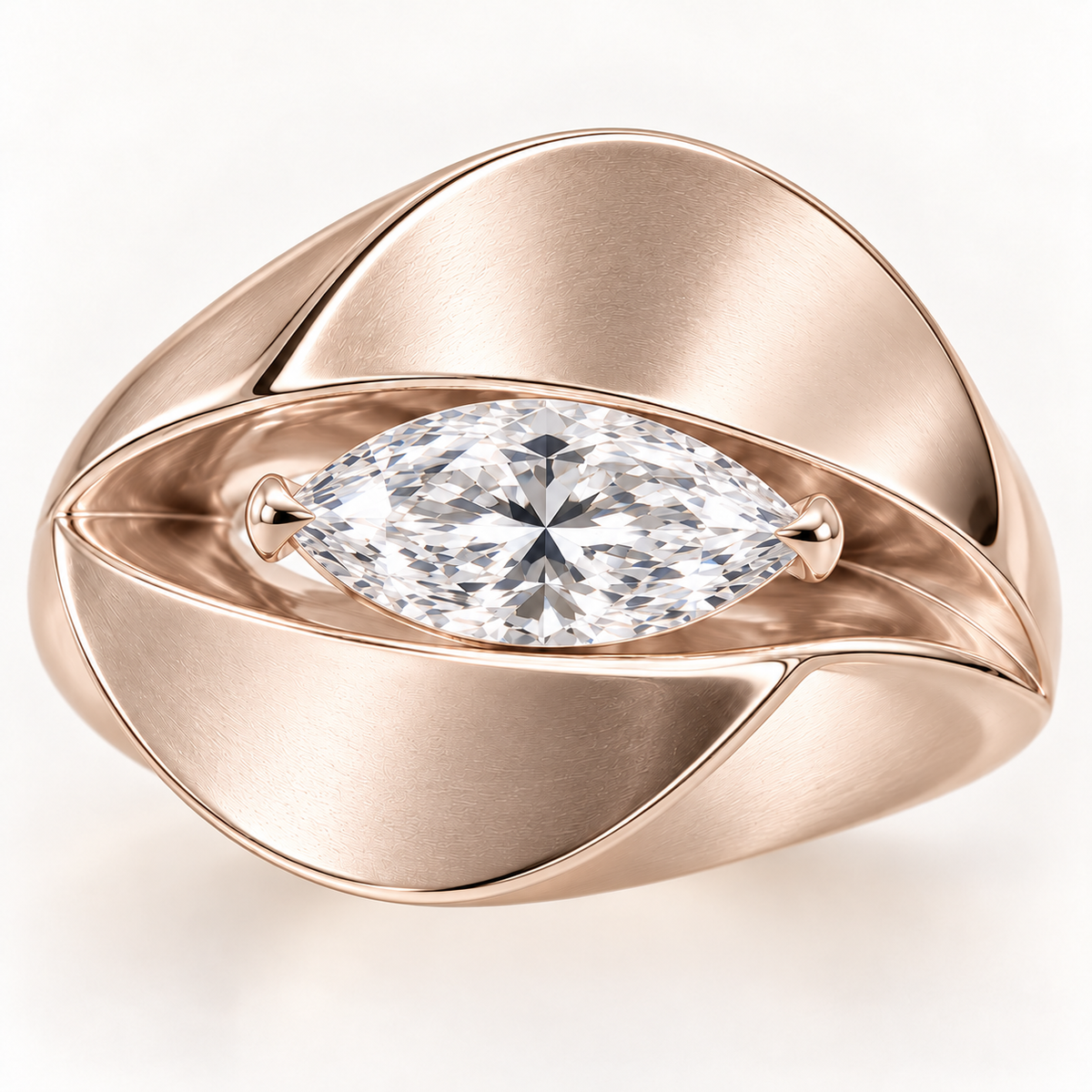 Design visualization of the Eclipse marquise diamond ring in pale champagne rose gold, showing satin surfaces and polished edges.