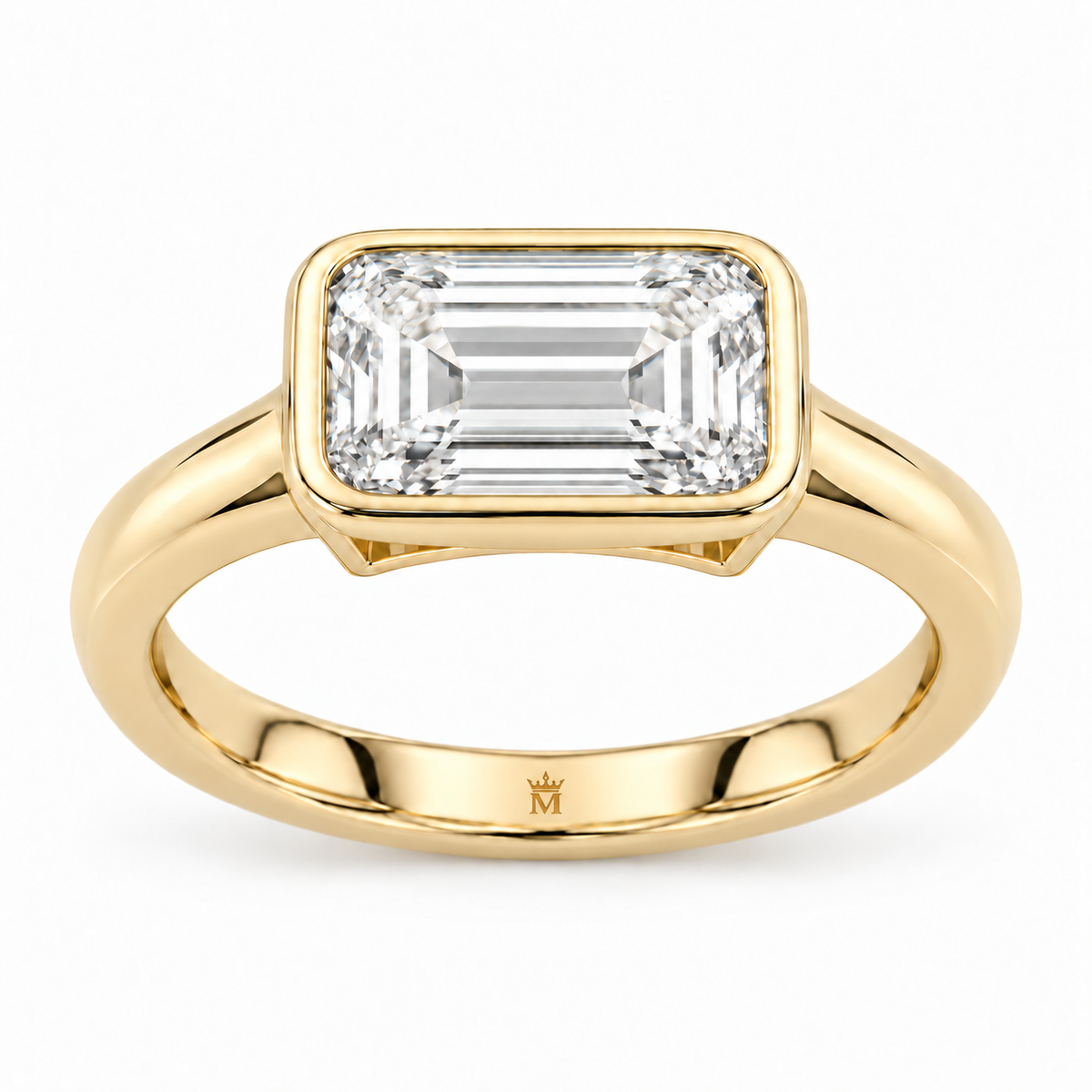 MISSISSI horizon east west ring front view. AI-edited crown-M engraving concept inside the lower band; engraving and scale are illustrative.