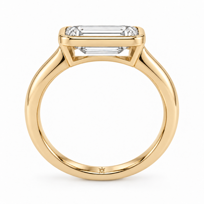 MISSISSI horizon east west ring profile view. AI-edited crown-M engraving concept inside the lower band; engraving and scale are illustrative.