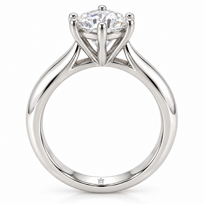 AI-generated design concept of a round brilliant ring, side. Illustrative geometry and scale; not a manufactured product photograph. Crown-M engraving design is shown inside the lower band; engraving is illustrative.