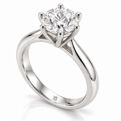 AI-generated engraving design concept of the MISSISSI round six-prong ring, opposite three-quarter view, showing the crown-M logo inside the lower band. Geometry, engraving and scale are illustrative; not a manufactured product photograph.