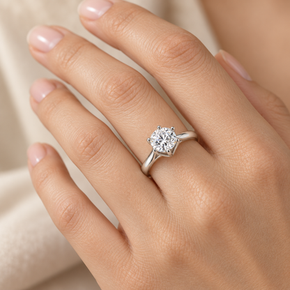 AI-generated design concept of a round brilliant ring, on hand. Illustrative geometry and scale; not a manufactured product photograph.