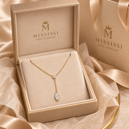 Ligne jewelry presented in champagne beige MISSISSI Fine Jewelry gift packaging.