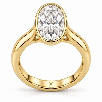 AI-generated design concept of an oval brilliant ring, front. Illustrative geometry and scale; not a manufactured product photograph. Crown-M engraving design is shown inside the lower band; engraving is illustrative.