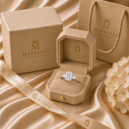 AI-generated packaging illustration of an emerald cut prong-set center with two tapered baguette side stones ring in a champagne MISSISSI ring box with gift box and shopping bag.