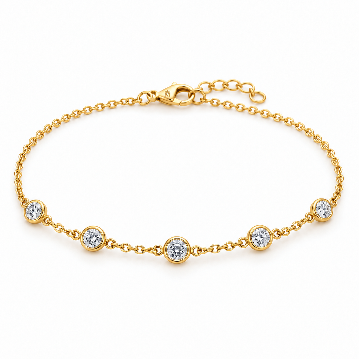 Five round lab-grown diamonds, each weighing 0.10 carat, sit in individual full bezel stations along a fine cable chain. A plain chain at the back and a lobster clasp complete the restrained design. AI-edited crown-M engraving concept on the existing lobster clasp shell; engraving and scale are illustrative.