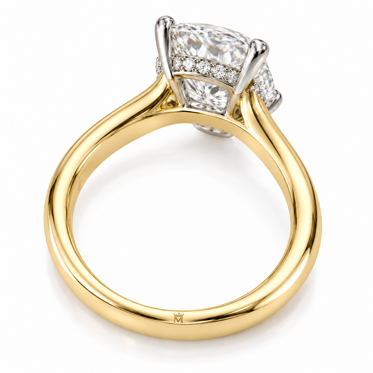 AI-generated design concept of an elongated cushion brilliant ring, bottom. Illustrative geometry and scale; not a manufactured product photograph. Crown-M engraving design is shown inside the lower band; engraving is illustrative.