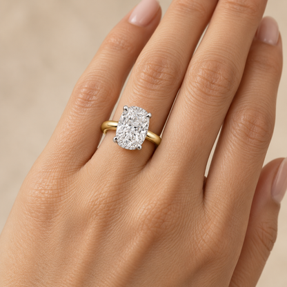 AI-generated design concept of an elongated cushion brilliant ring, on hand. Illustrative geometry and scale; not a manufactured product photograph.
