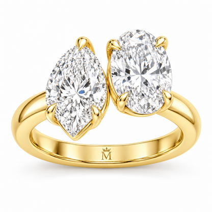 Amour pear and oval Toi et Moi engagement ring in 14K yellow gold, right three-quarter product view on white.