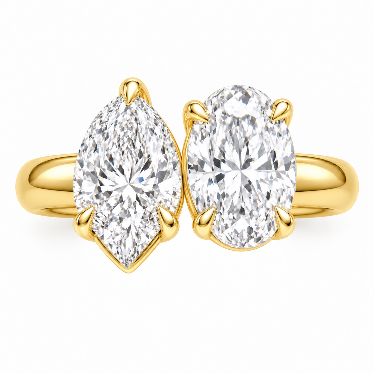 Amour pear and oval Toi et Moi engagement ring in 14K yellow gold, top-down product view on white.