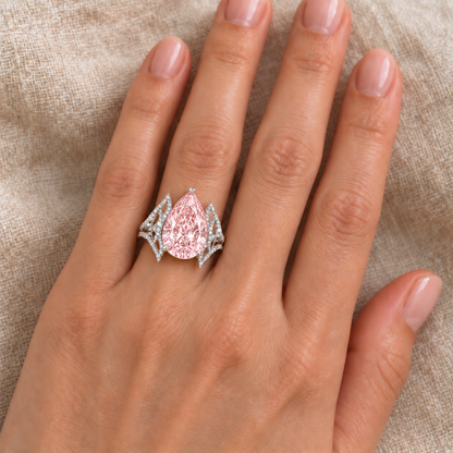 Blush Ogive on a left ring finger