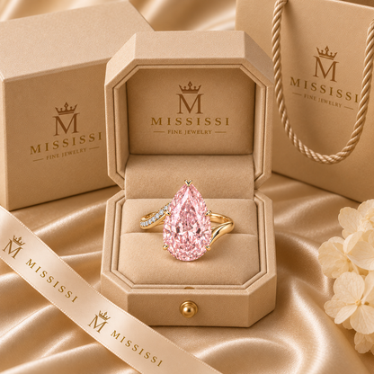 AI design preview of Blush Current pink pear ring in champagne MISSISSI packaging