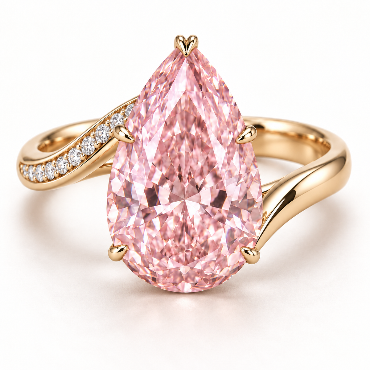 AI design preview of MISSISSI Blush Current pink pear ring in yellow metal with one pavé ribbon and one polished ribbon
