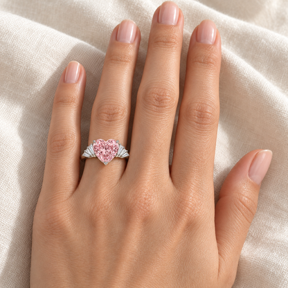 MISSISSI Pink Serenade ring worn on a model’s left ring finger
